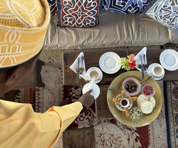 Emerson on Hurumzi Iftar table setting waiter pointing 002